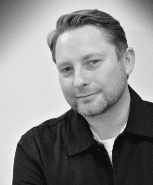 Black and White head shot image of Mike Staples